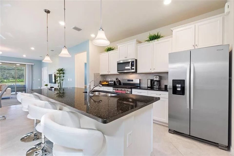 Fully equipped kitchen including coffee pot, toaster, plenty of cups, dishes and anything you can think of. Gas stove, large refrigerator, microwave, and a large dishwasher all stainless steel.
