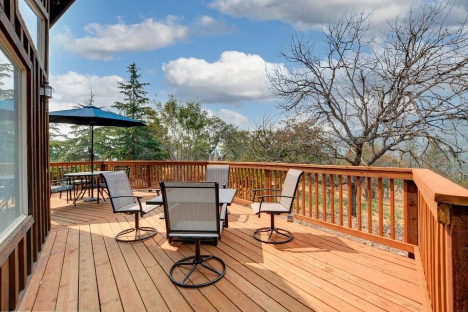 Large deck with table, chairs and fire table for relaxing and dining!