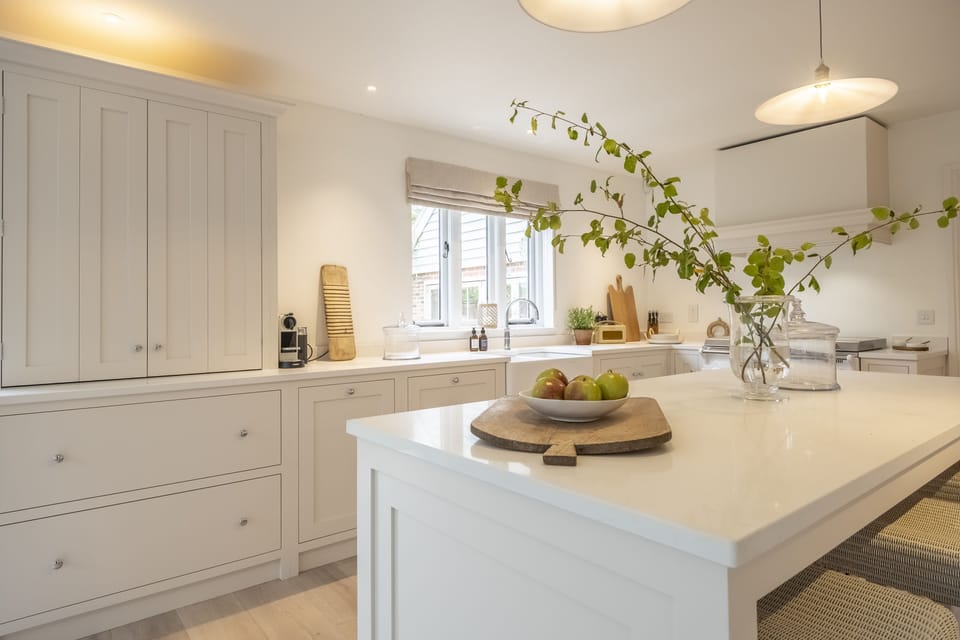 Ground floor: Kitchen island with additional seating