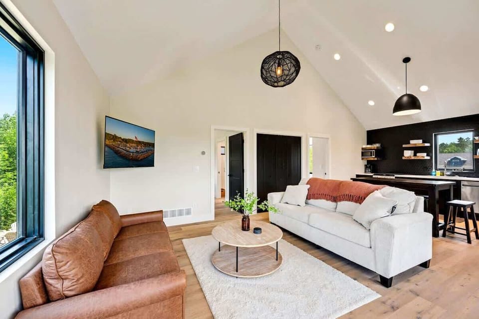 Immerse yourself in an open floor-plan where the living and dining areas seamlessly blend together, forming the perfect space to gather and forge enduring memories. 