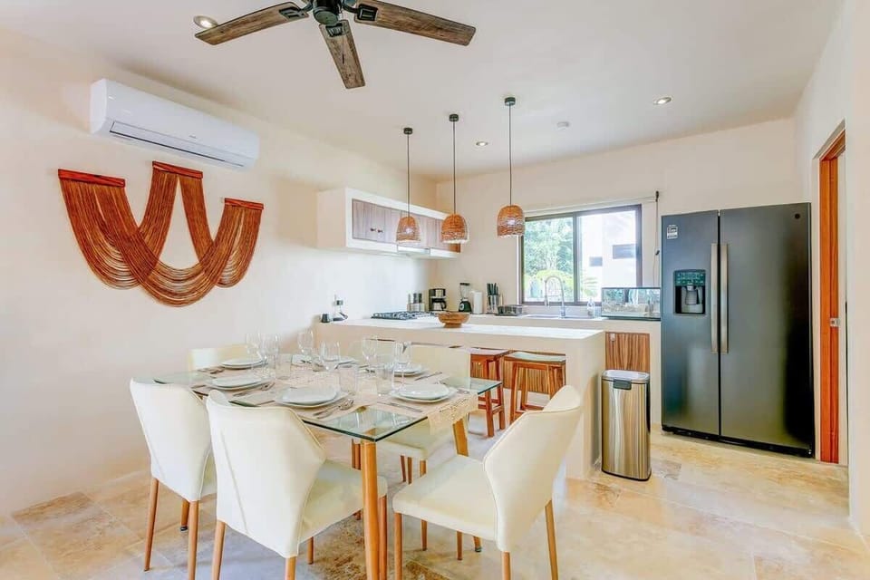 Enjoy your delicious meals at the dining table with cushioned chairs