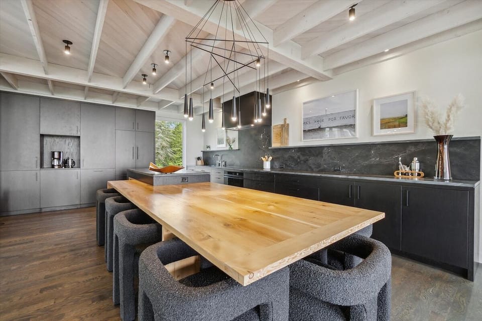Spacious island dining room table that comfortably seats 8.