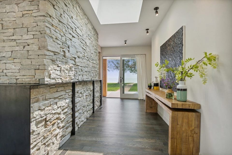 Be welcomed with a light-filled entryway and thoughtfully gathered Door County tourism packets/details to map out your incredible stay while at Clay Banks Lake House. 