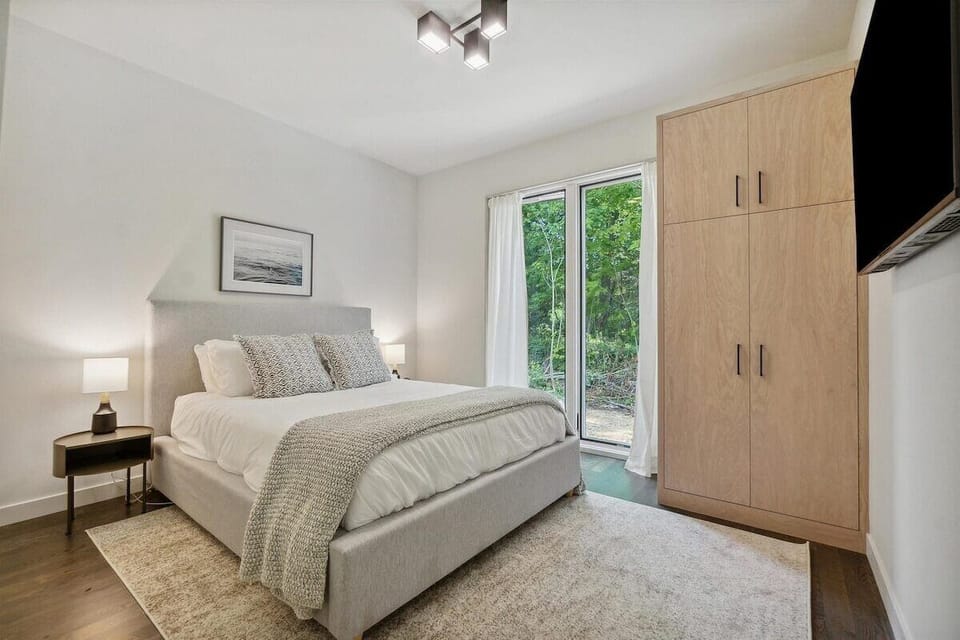 The second bedroom has built-in storage to unpack into and a comfortable Queen Size bed to enjoy during your stay. 