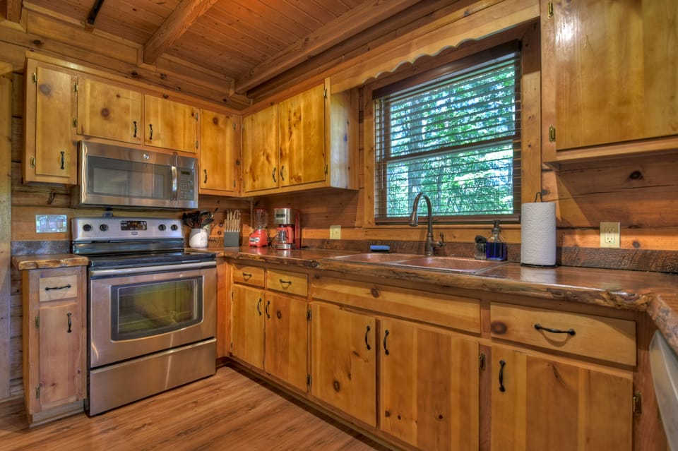 Fully furnished kitchen with beautiful custom counters and stainless steel
