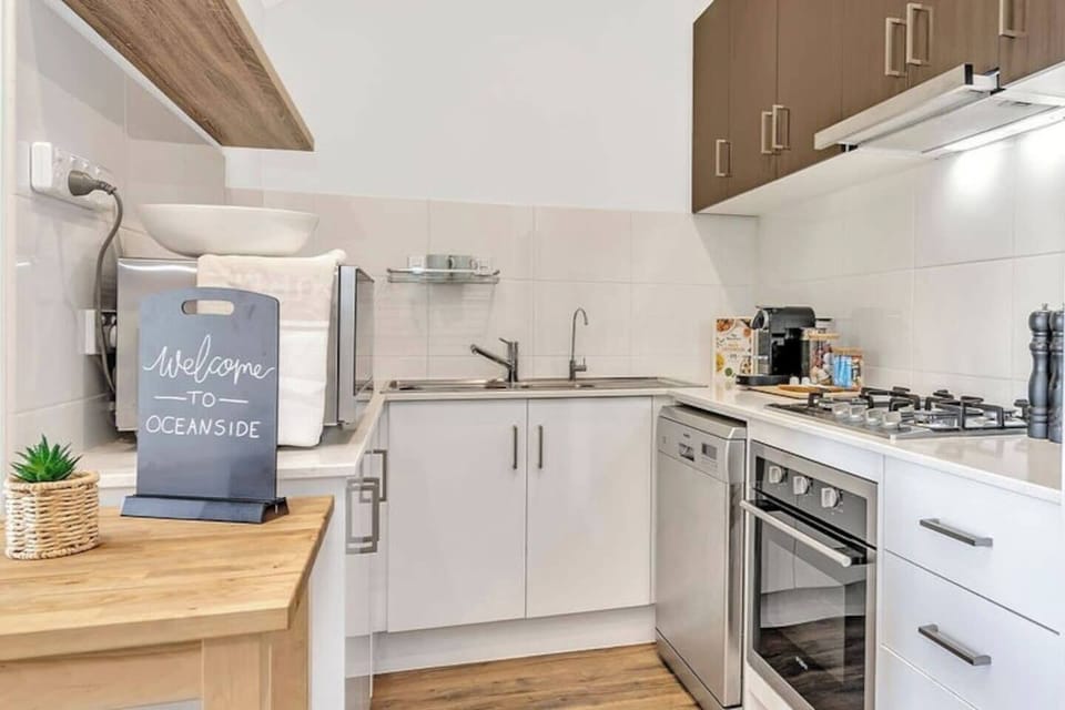 The modern kitchen is well-appointed with all you need to cook up a feast, plus a dishwasher for easy clean-up. 