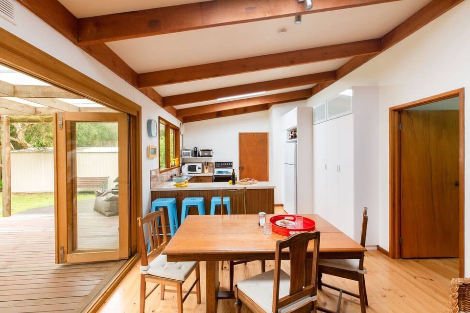 An open plan kitchen and dining area makes the cottage feel more spacious. 