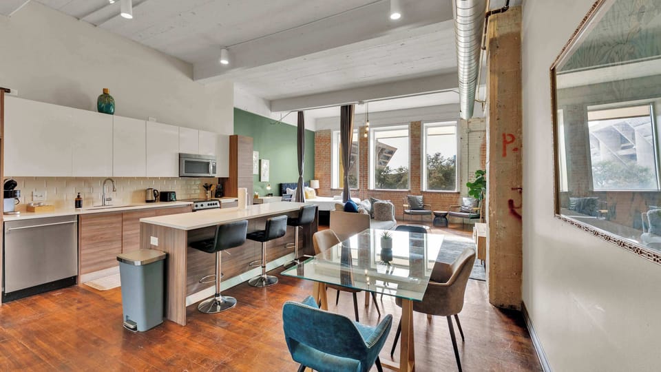 Kitchen & Living Area: Modern space with sleek appliances and bright natural light for perfect meals!