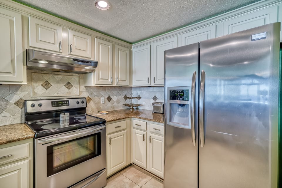 This beautiful upgraded Kitchen has all the comforts of home Florida Style.