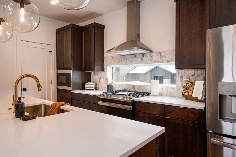 Cook your favorite meals in a kitchen bathed in natural light that enhance the culinary experience.
