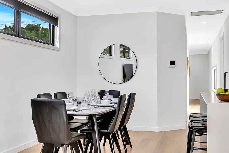 Enjoy meals in the dining area, complete with a six-seater table.