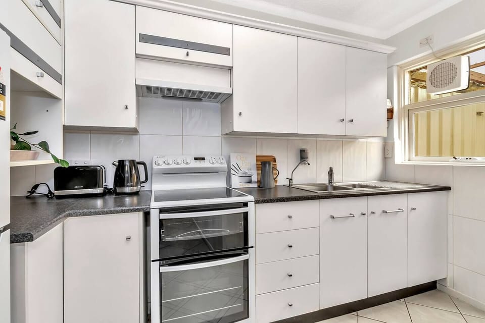 When you’re not sampling Henley Beach’s vibrant restaurant scene, the well-appointed kitchen has everything that’s needed to cook meals at home as well as a dishwasher for easy clean-up. 
