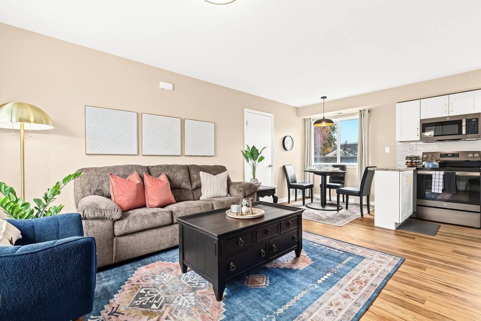 This inviting living and dining area is the perfect space to unwind and make memories