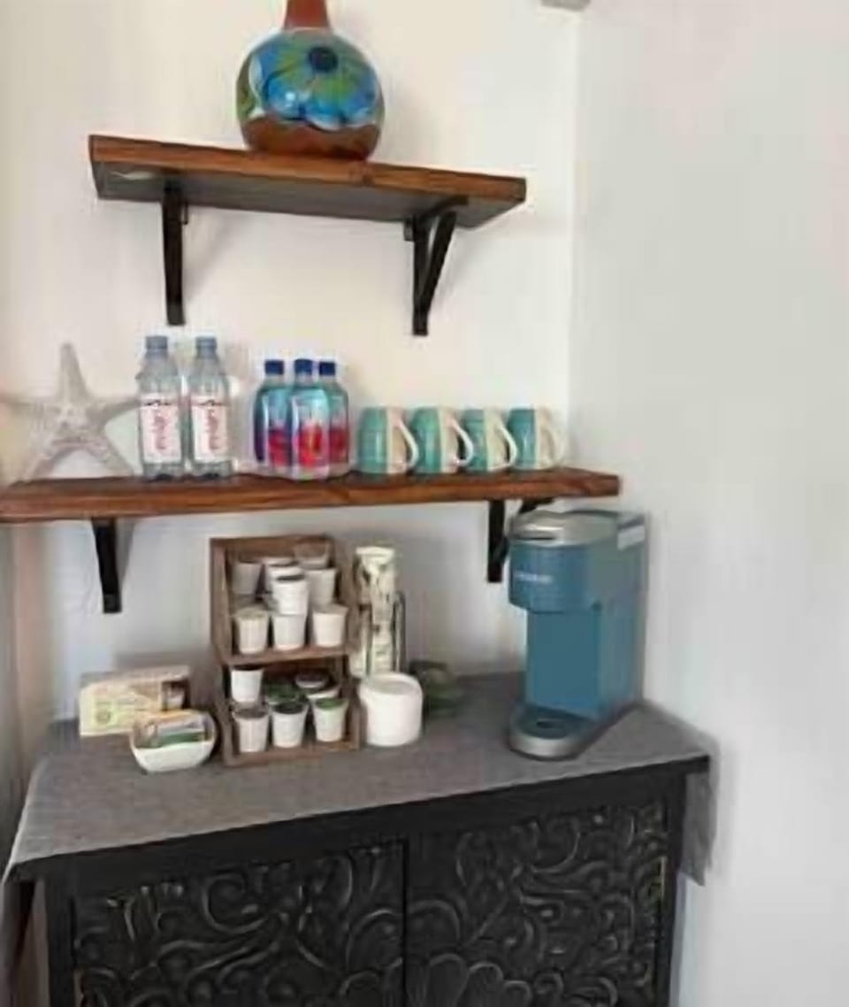 Enjoy a cup of coffee or tea in the privacy of this upstairs bedroom.