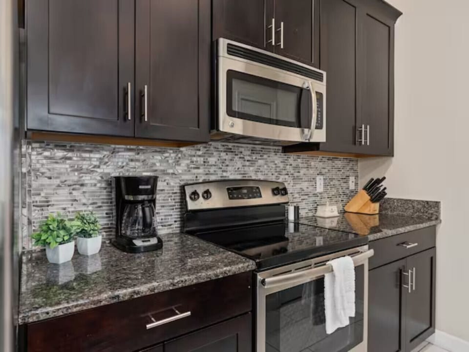 Whip up culinary magic in our modern kitchen, where every dish is made with love and creativity. 🍳✨
