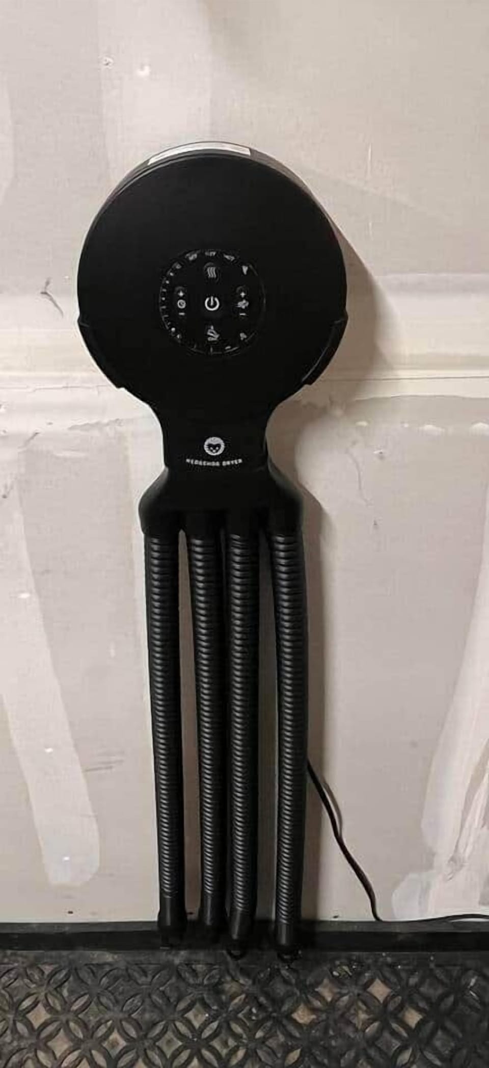 Ski and snowboard boot dryer conveniently mounted in the garage for your use. 