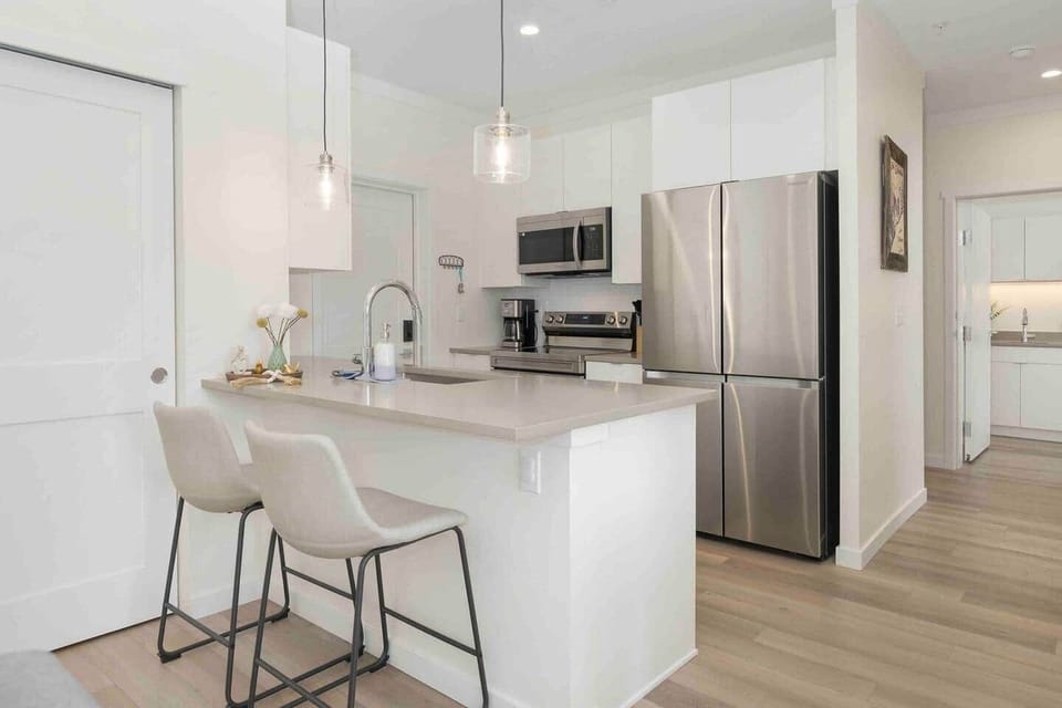 Additionally there are 2 seats  at the kitchen bar. The kitchen is equipped with all you need to cook a fabulous meal. Everything is provided such as a crockpot, coffee maker, Keurig, French Press, tea kettle, toaster, pots pans. etc