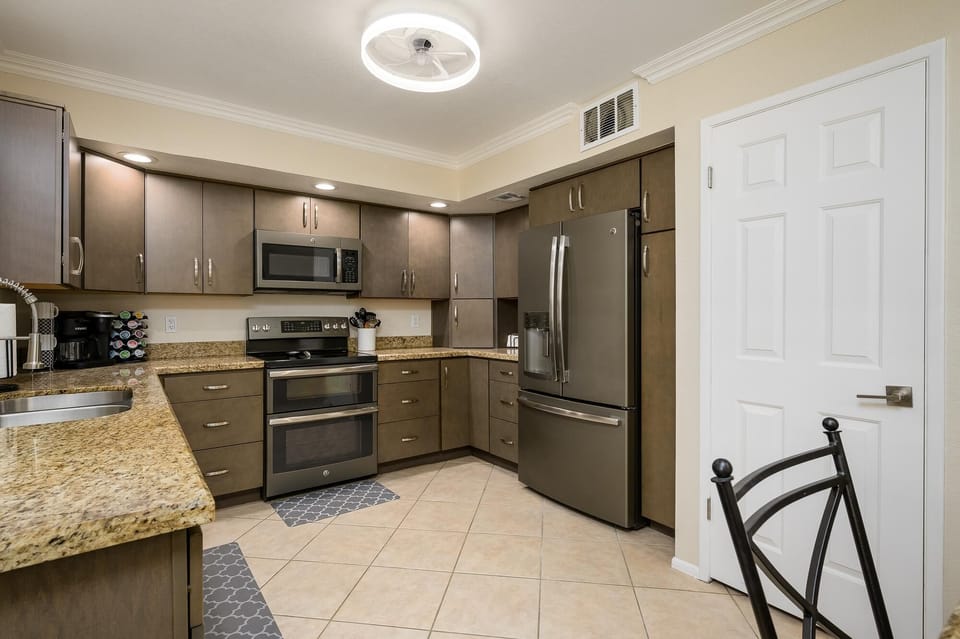 Updated kitchen with new appliances and granite counter tops.