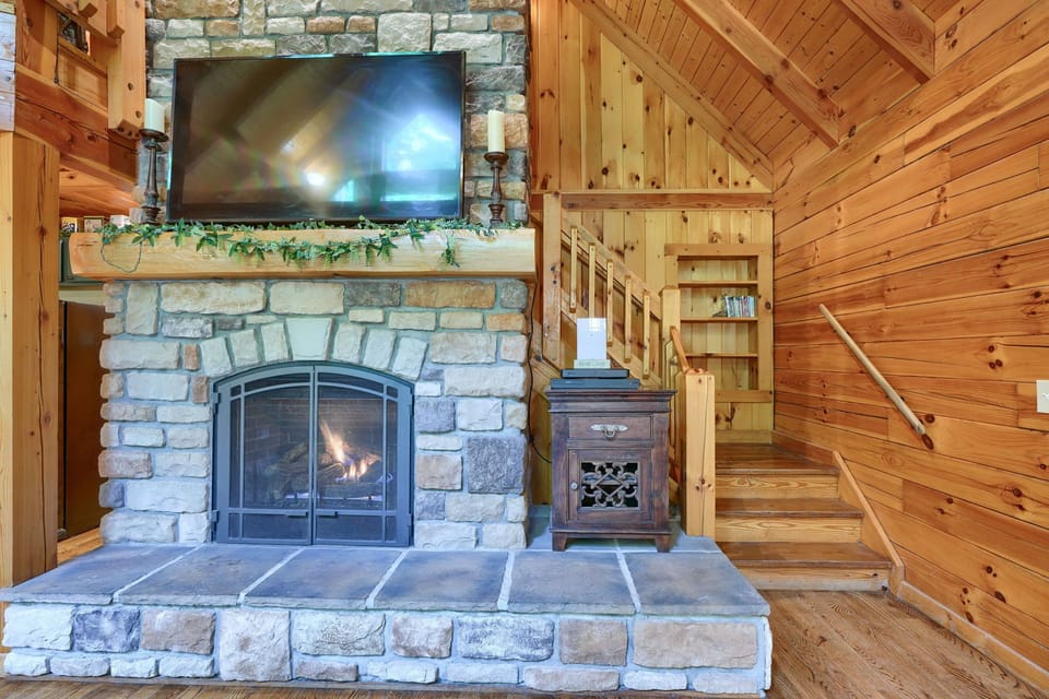 The living room boasts a stunning Electric Fireplace
