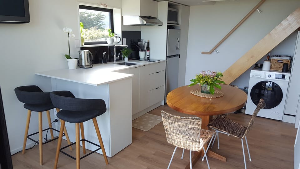 The breakfast bar doubles as a work space if required