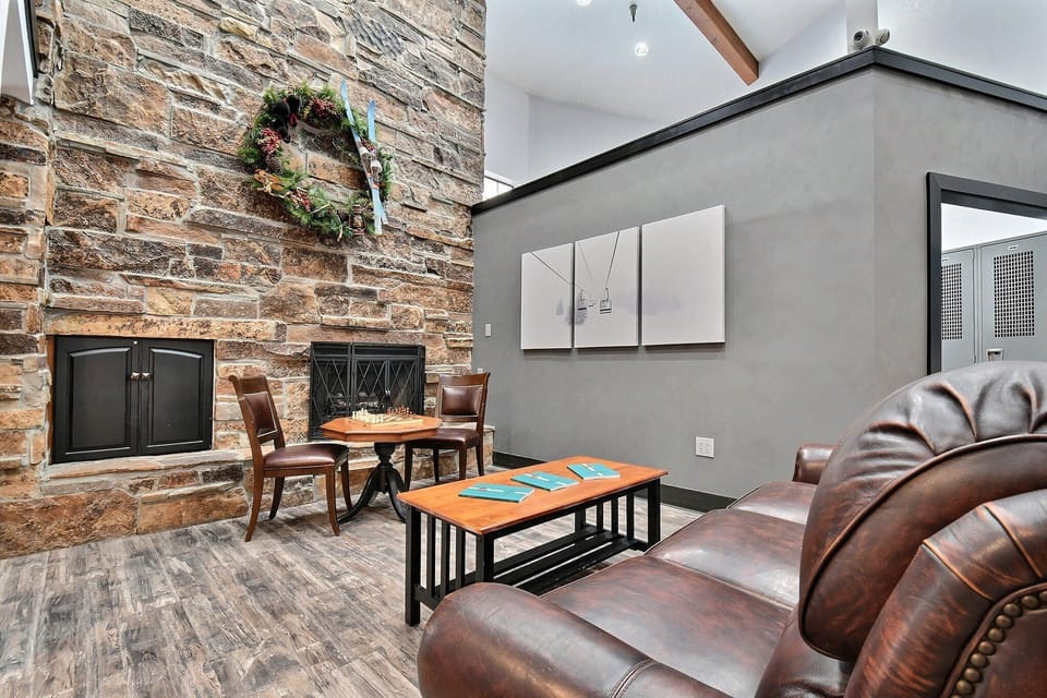 Additional seating area in the building lobby with fireplace and lounge space.