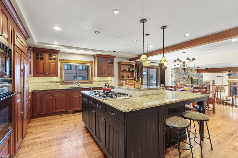 High end appliances and a bright kitchen with plenty of light.