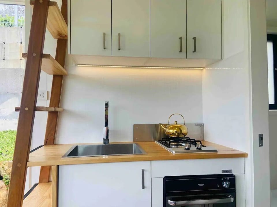 Kitchen with oven and gas cooktop

Ladder to the loft bedroom