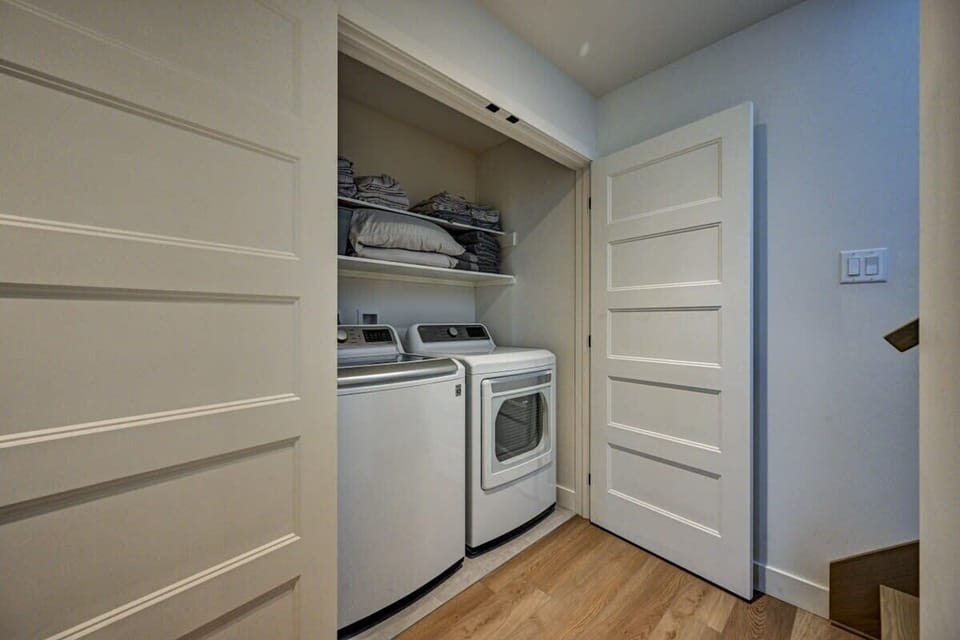 Laundry area with washer and dryer for your convenience