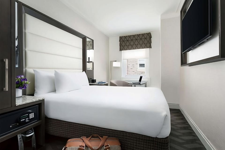 Stretch out on a plush bed with calming, sunlit views.