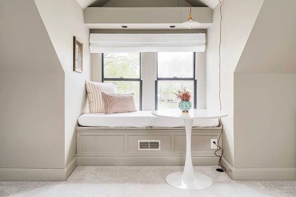 Primary Suite | Master bed, twin day bed, bistro table sitting area