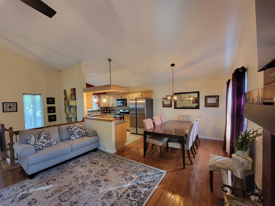 Open concept living room, dining room, and kitchen on the main level.