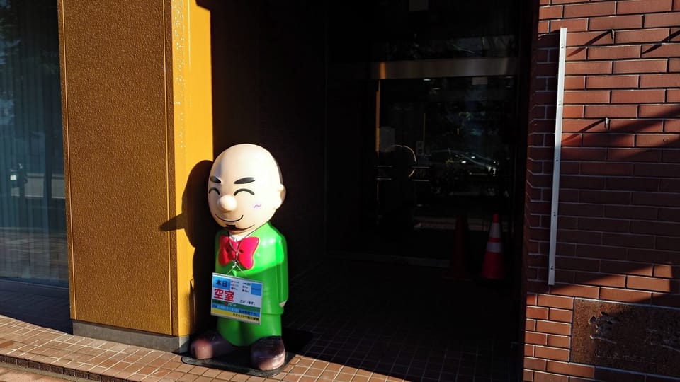 In front of the entrance