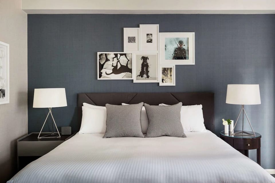Sink into crisp linens for a deeply restful night’s sleep.