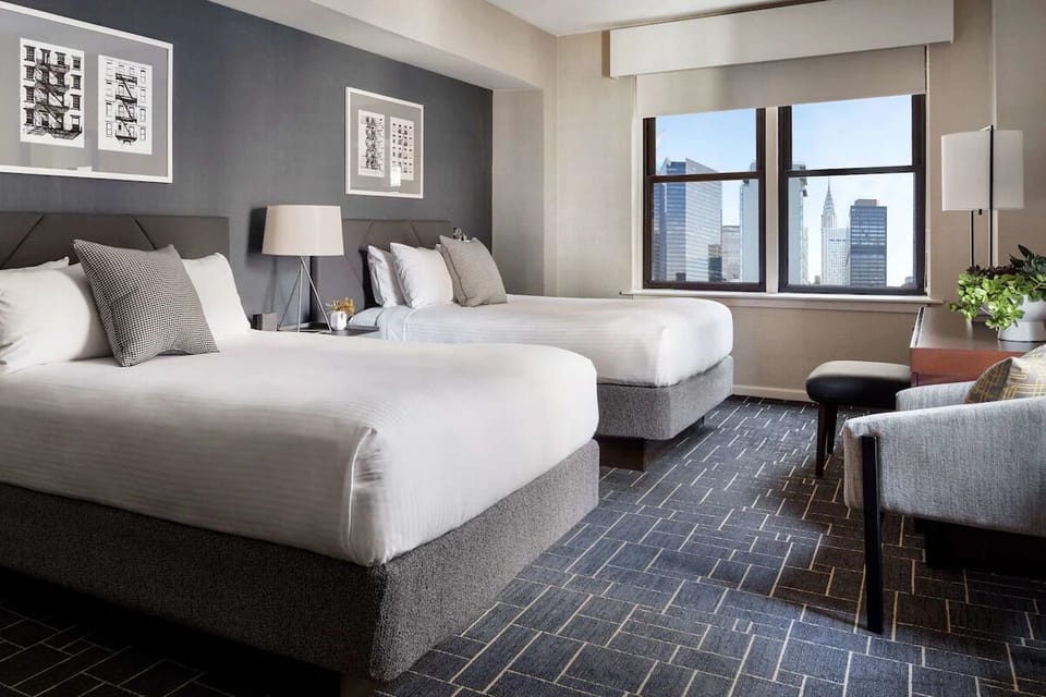 Stretch out on plush beds after a day in town.