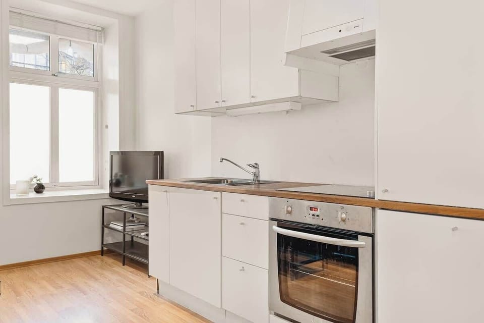 The kitchen is fully equipped with all the utensils you need to prepare your favorite meals at home.