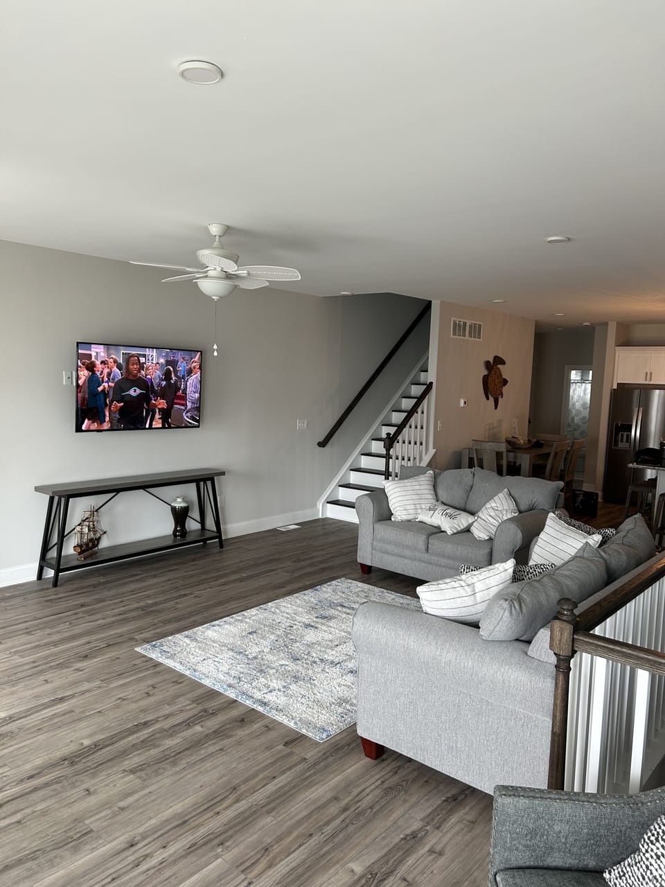 Living Room with pull out Queen sofa bed and 60 inch Smart TV