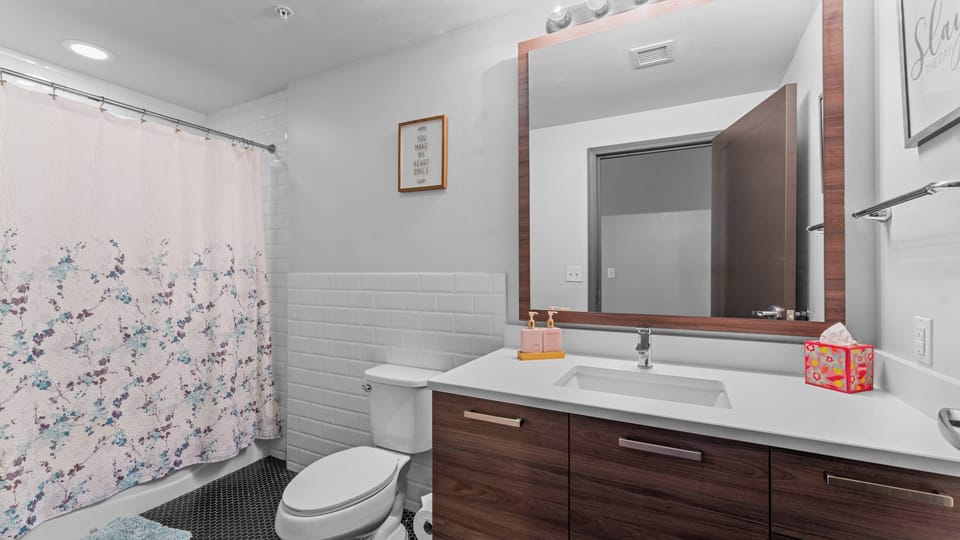 Luxurious Bathroom: Enjoy modern elegance with  sinks and a sleek walk-in shower
