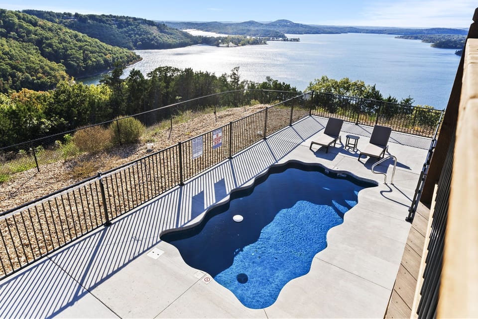Enjoy the beautiful PRIVATE outdoor pool overlooking the expansive lake views is perfect for relaxing!