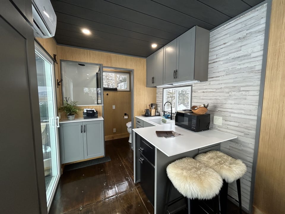 View of kitchenette from queen bed