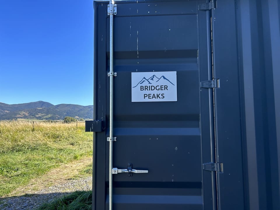 Bridger Peaks sign on shipping container door