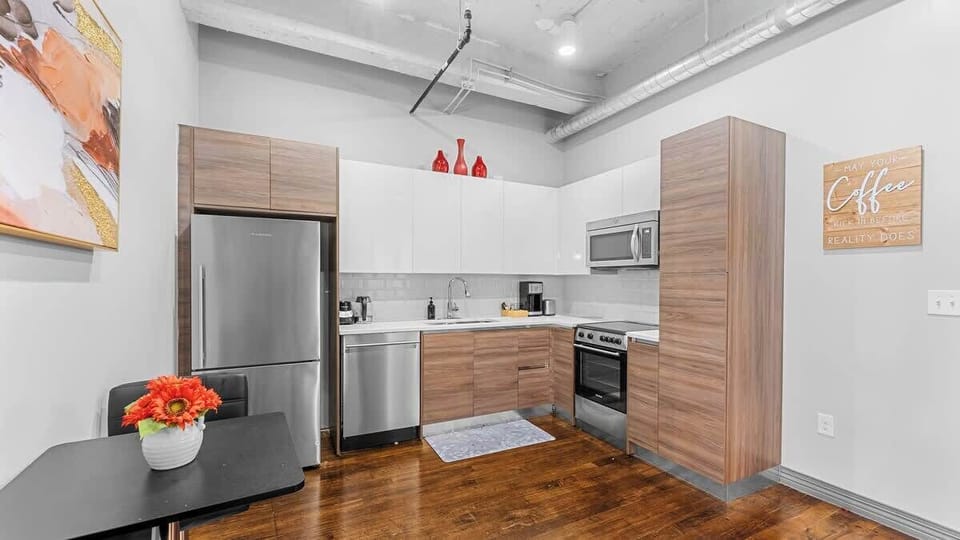 Modern Kitchen: Whip up delicious meals in this sleek kitchen with stylish decor and vibrant accents!
