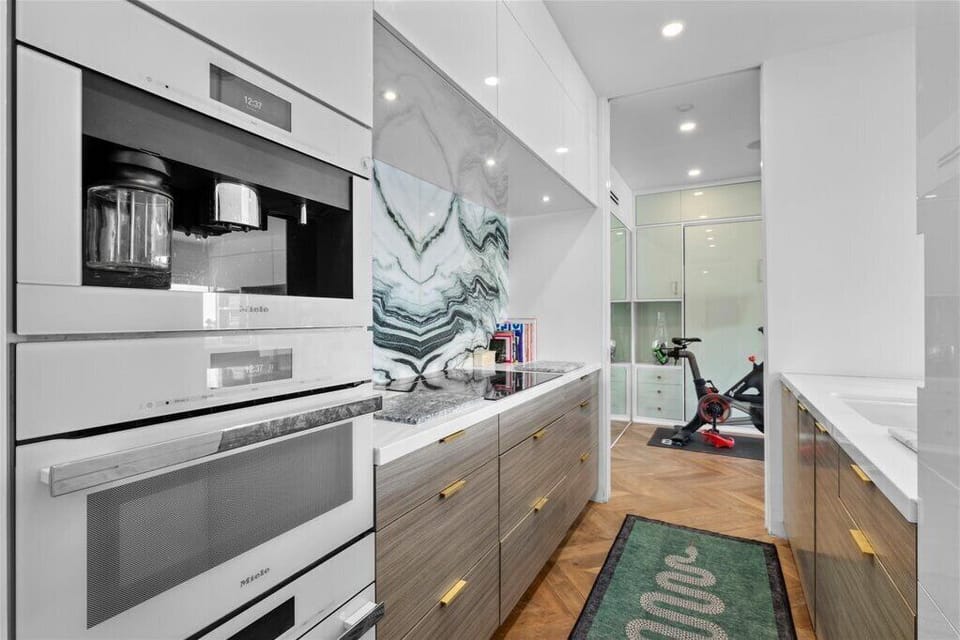 Kitchen with all Miele appliances; Coffee Machine, Microwave, Oven, Stove, D/W