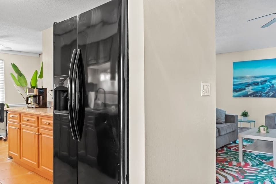 {KITCHEN} The spacious granite counter tops provide ample space for meal preparation, while the modern amenities ensure that cooking is a breeze. We've provided all the necessary kitchen amenities, so you can prepare and enjoy delicious meals.