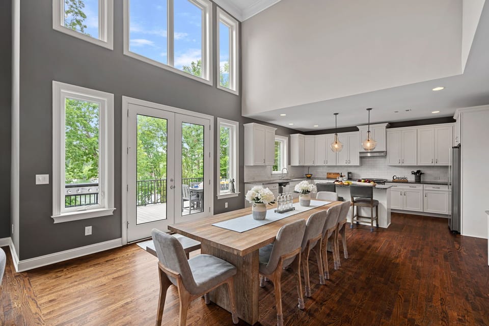Dining area with seating for 8 between the kitchen and living room.