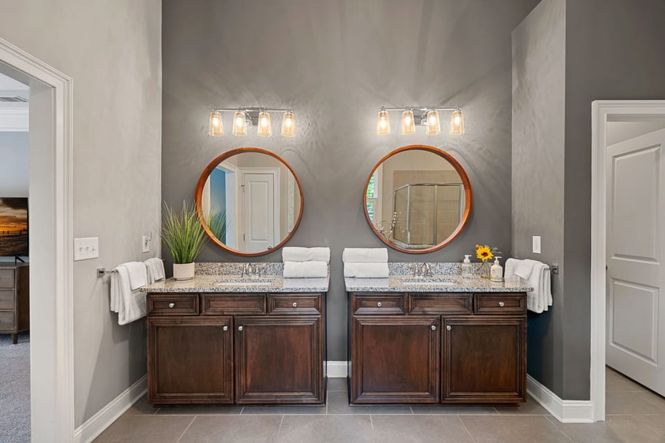 Primary Bath with dual vanities, soaking tub and separate shower.