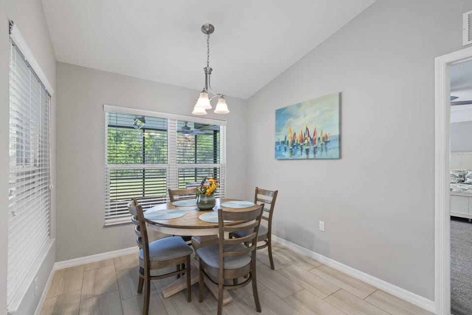 Charming Breakfast Nook with Serene Backyard Views