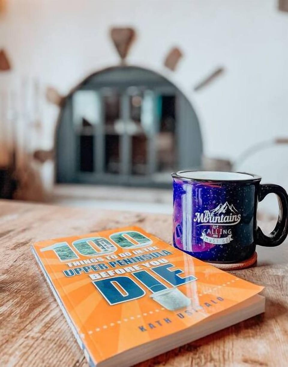 Enjoy a warm cup of coffee or tea while reading in front of the fire in the living room. 