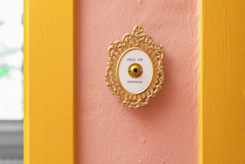 When life gives you a golden button, press for champagne.