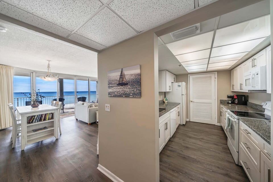 The fully equipped kitchen features granite countertops and has everything you need to prepare meals for family & friends.