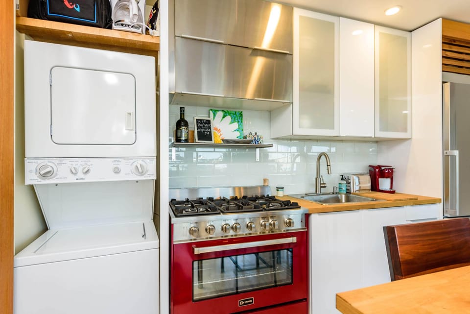 Galley kitchen with washer and dryer